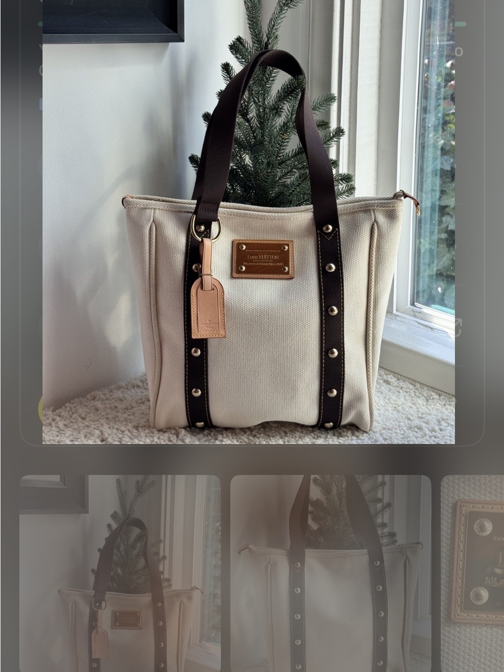 Authentic Louis Vuitton tote in brown leather trim and silver stud w/luggage tag